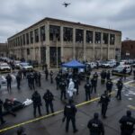 Hate Streamer’s Rampage — Tennessee Courthouse BLOODSHED… Police officers and FBI agents at a crime scene with a drone overhead
