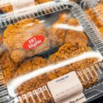 Massive SNAP Red Flags In States That Cooperate Packaged fried chicken in a grocery store with EBT eligibility label