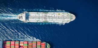 Two cargo ships navigating through the ocean