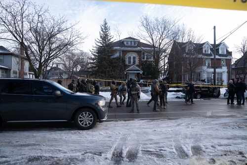 Minneapolis,,Minnesota,,United,States,,07.01.2026,Law,Enforcement,On,Site,After Law enforcement officers in tactical gear at a crime scene surrounded by police tape